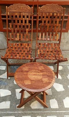 wooden folding chairs and table