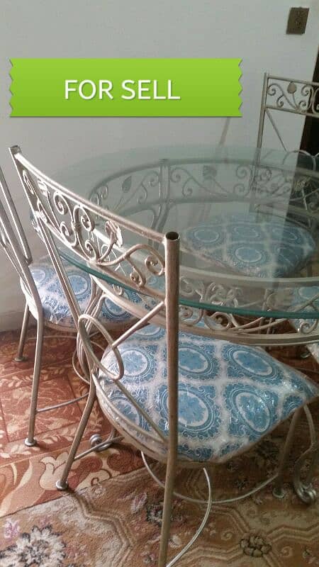 rod iron dining table with glass top 4 chairs 1