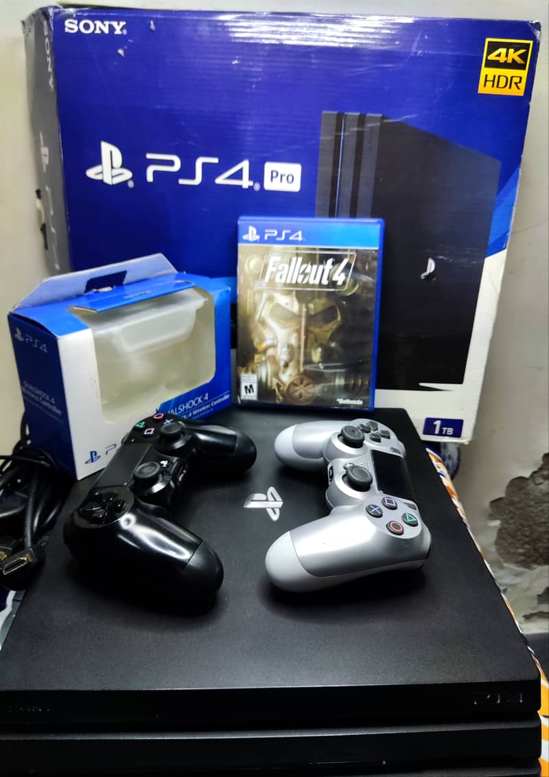 Ps4 pro 1 TB 2 controllers 6 month ps plus primary Gta 5 downloaded m 5