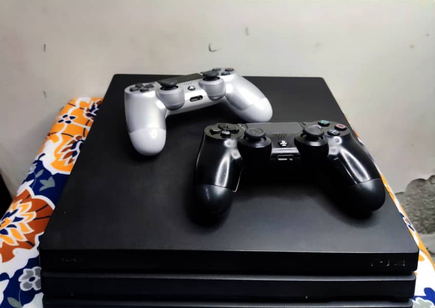 Ps4 pro 1 TB 2 controllers 6 month ps plus primary Gta 5 downloaded m 14