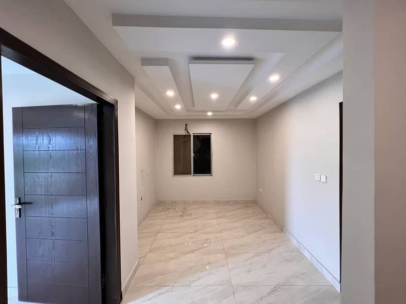 1 BEDROOM BRAND NEW APARTMENT FOR SALE IN SECTOR E BAHRIA TOWN LAHORE 7