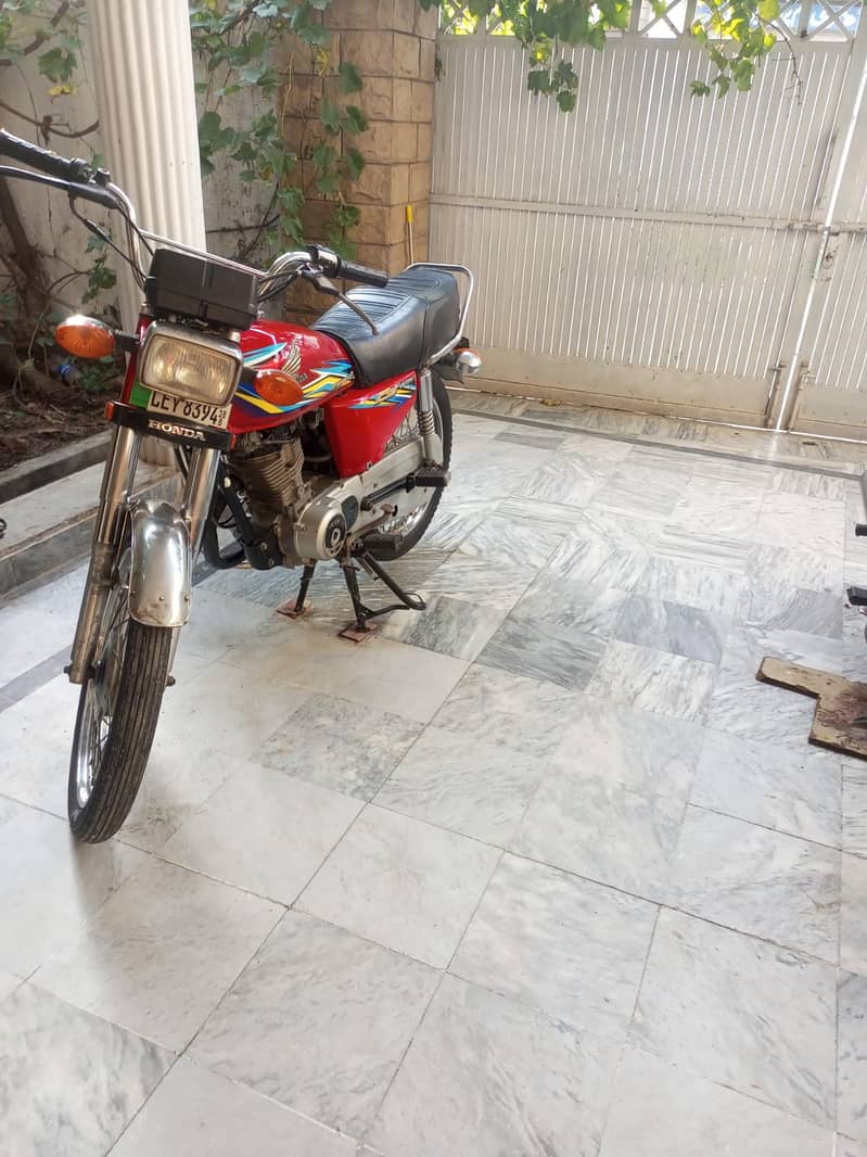 Honda 125 model 2018 Lahore registered all documents complete 7