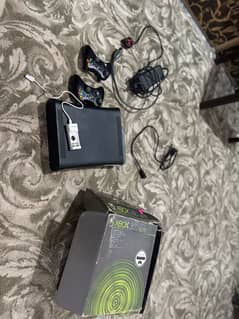 Xbox 360 with wireless controllers and chargable camelion new cells