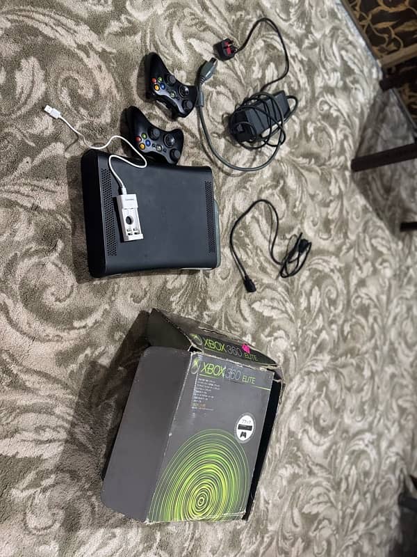 Xbox 360 with wireless controllers and chargable camelion new cells 1