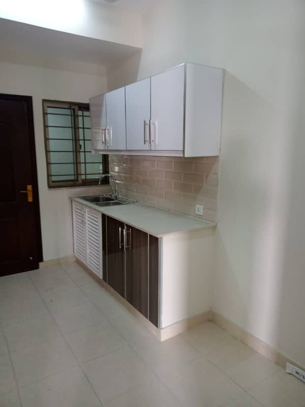 10 Marla 3 Bedrooms Flat fully Tiled For Rent 2