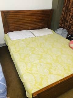 Slightly used king size bed (Without mattress)