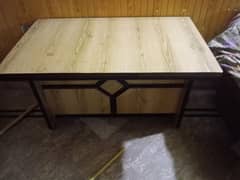 A little used office table with chairs, executive chair