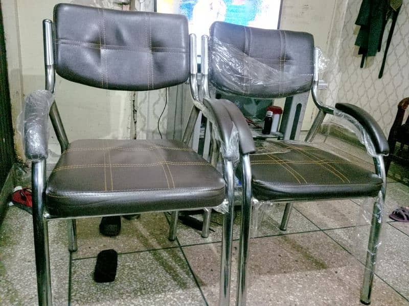 A little used office table with chairs, executive chair 2