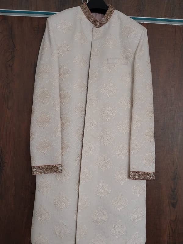 Very elegant Branded Sherwani with light Embroidery and New condition 4