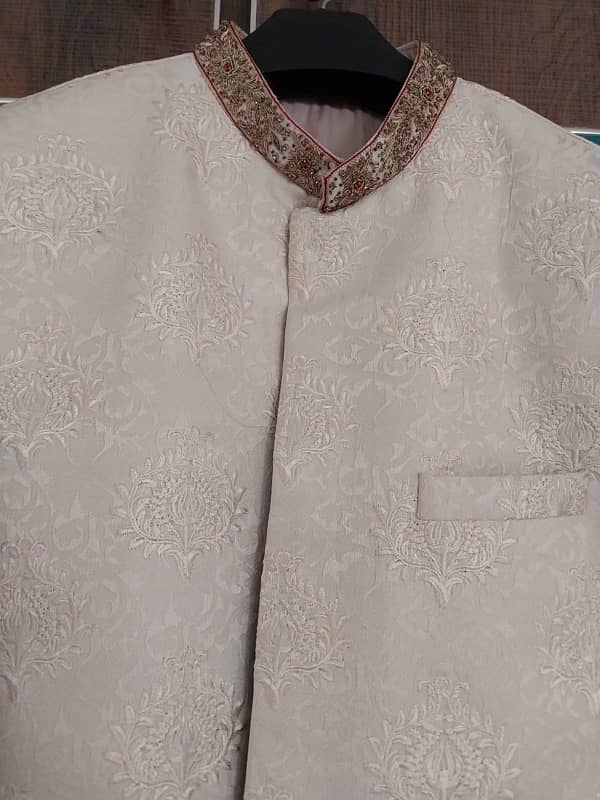 Very elegant Branded Sherwani with light Embroidery and New condition 8