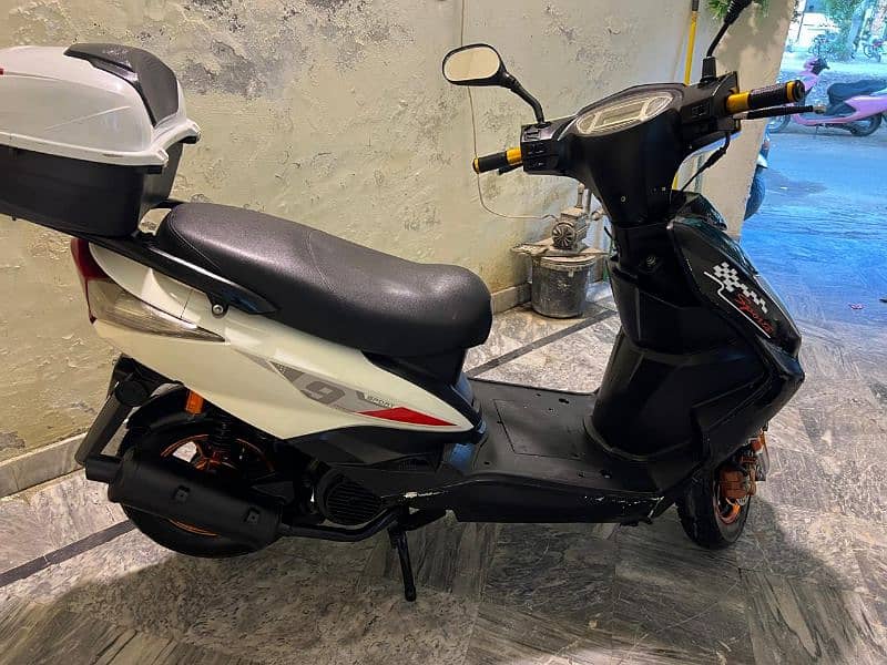 ow petrol scooty 2022 self start 7