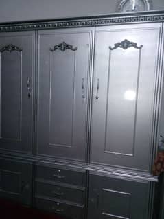 new cupboards in real wood with silver deco paint