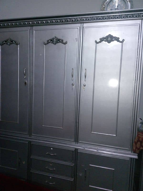 new cupboards in real wood with silver deco paint 0