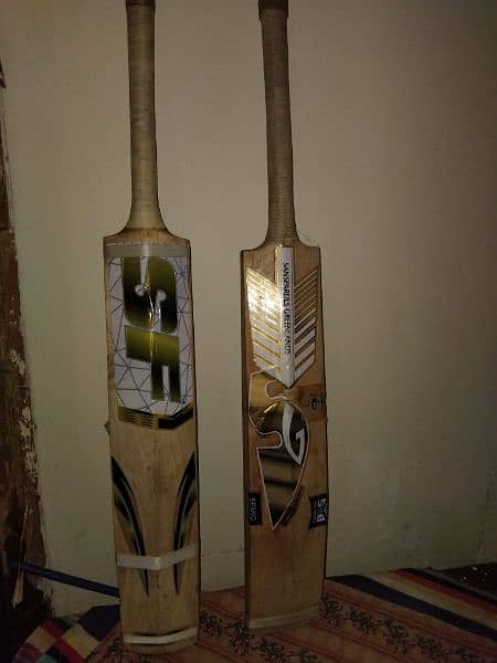 2 hardball bats and one thigh pad contact number 03099801229 0