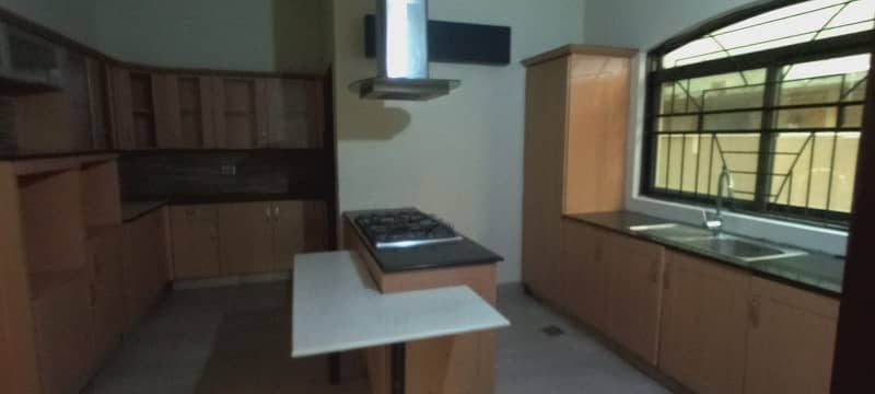 Slightly Used One Kanal Modern Bungalow For Rent In Top Location Of DHA Phase 5 Block b near park 17