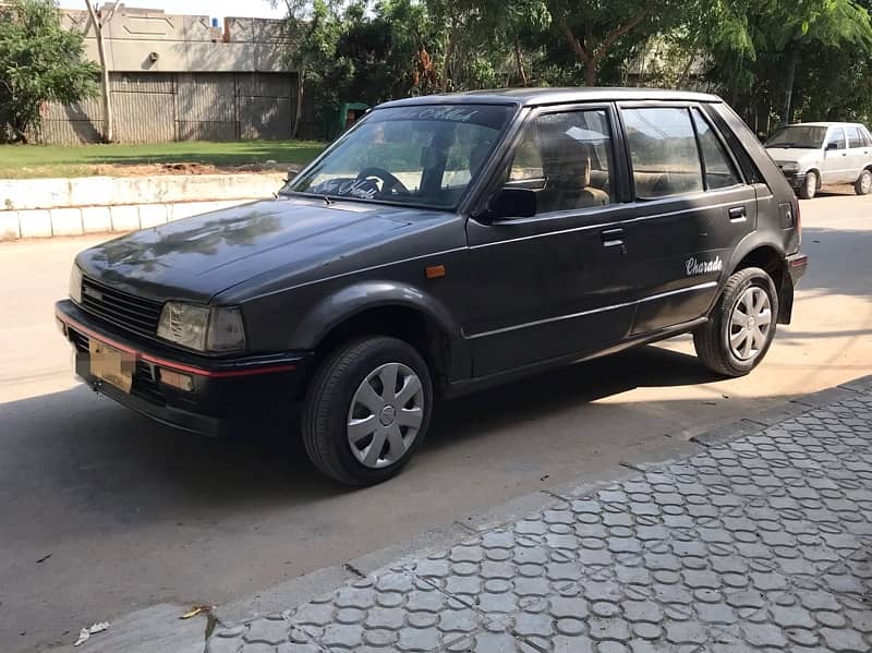 Charade Cx Dubai import (ReadAd) bst then mehran khyber fx alto cultus 2