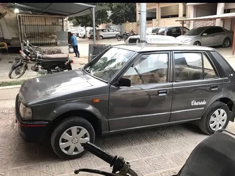 Charade Cx Dubai import (ReadAd) bst then mehran khyber fx alto cultus 14