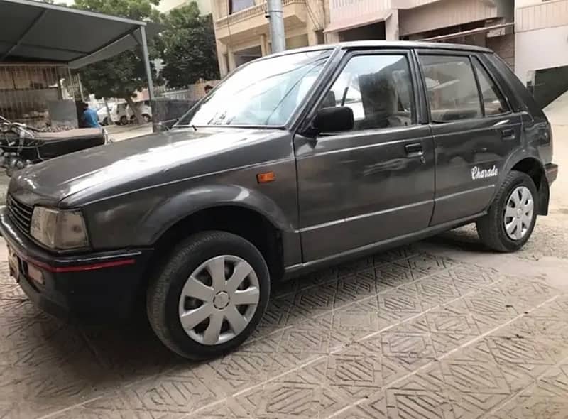 Charade Cx Dubai import (ReadAd) bst then mehran khyber fx alto cultus 17