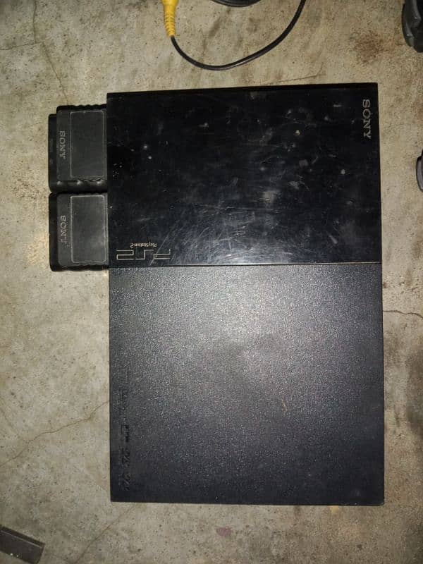 PlayStation 2 (slim) with Bluetooth remotes 1