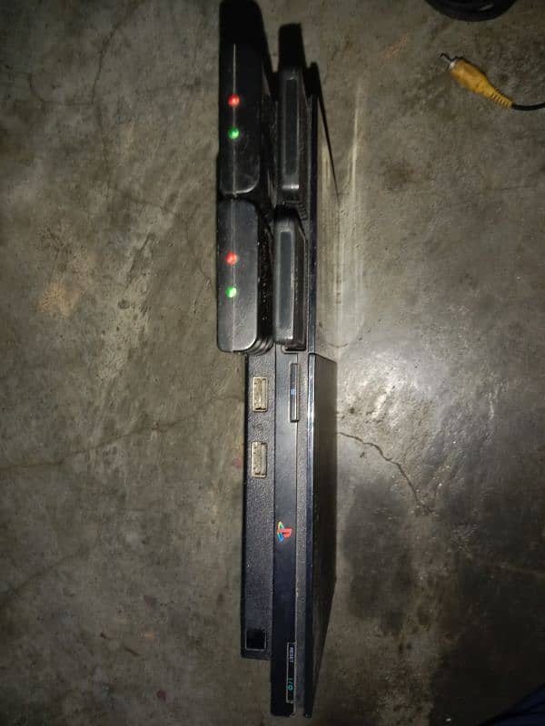 PlayStation 2 (slim) with Bluetooth remotes 2