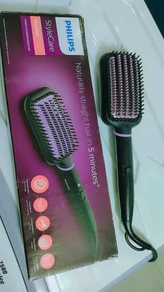 Philips heated Straightener hairs brush original UAE model.