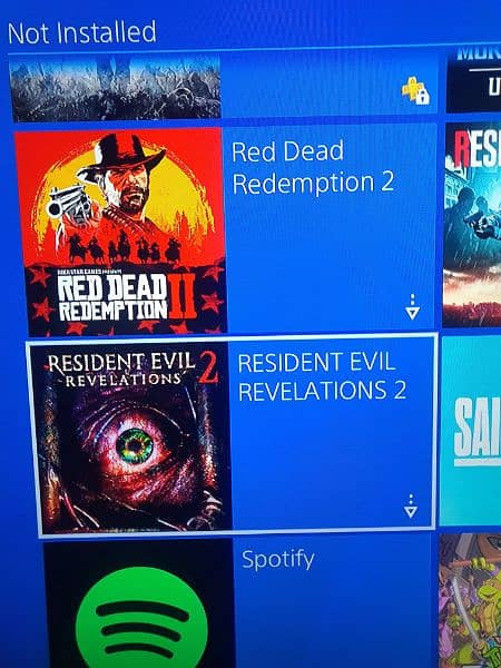 ps4 slim with original controller and RDR 2 tekken 7, RE 2 installed 4