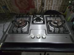 Gas stove with battery cells