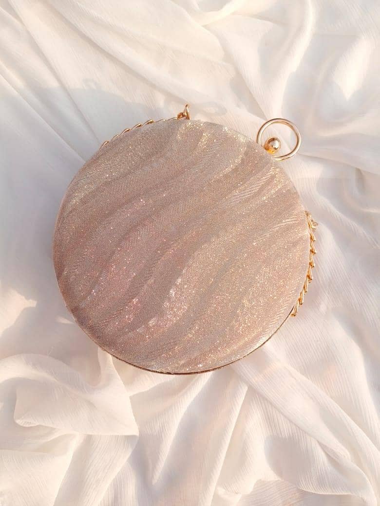 women's round shimmery clutch 4