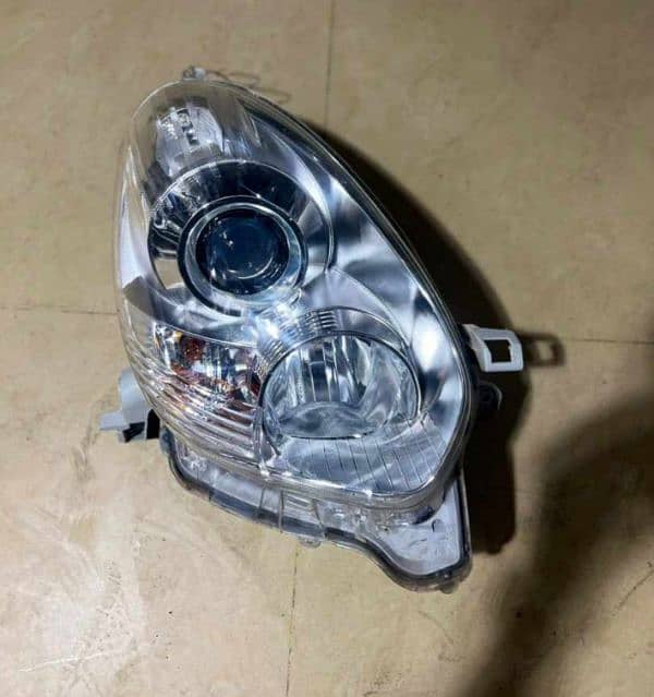 Toyota Passo 2011,,,2014 Head lights HID 1