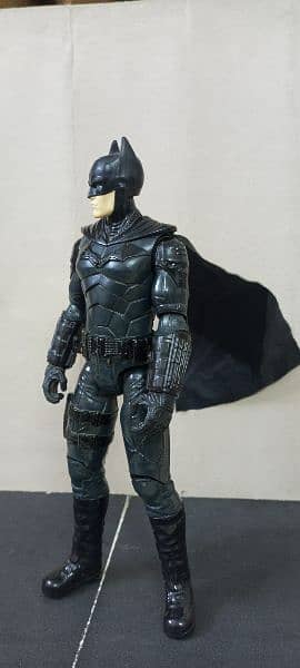 The Batman 2023 movie figure and The Spiderman 3 movie deluxe figure 4