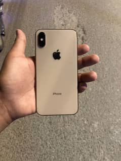 I phone xs pta golden colour water pack 10/10 condition 0