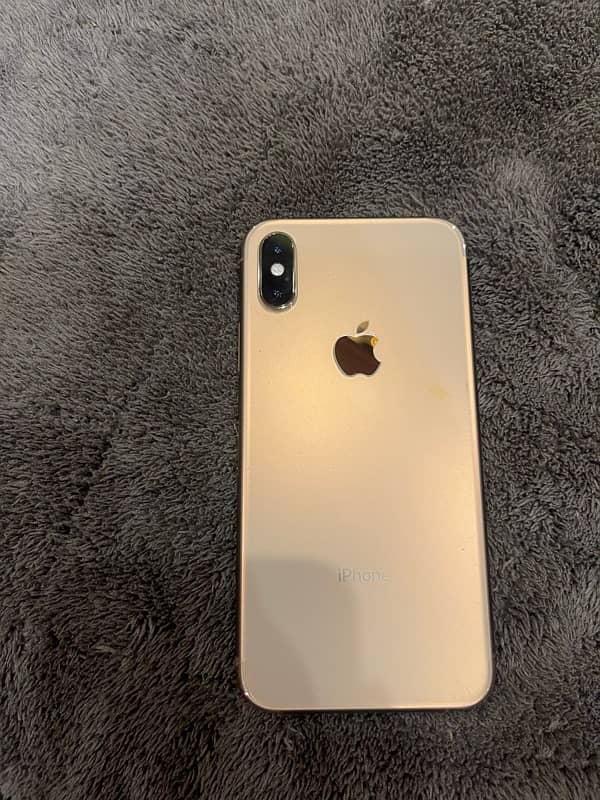 I phone xs pta golden colour water pack 10/10 condition 9