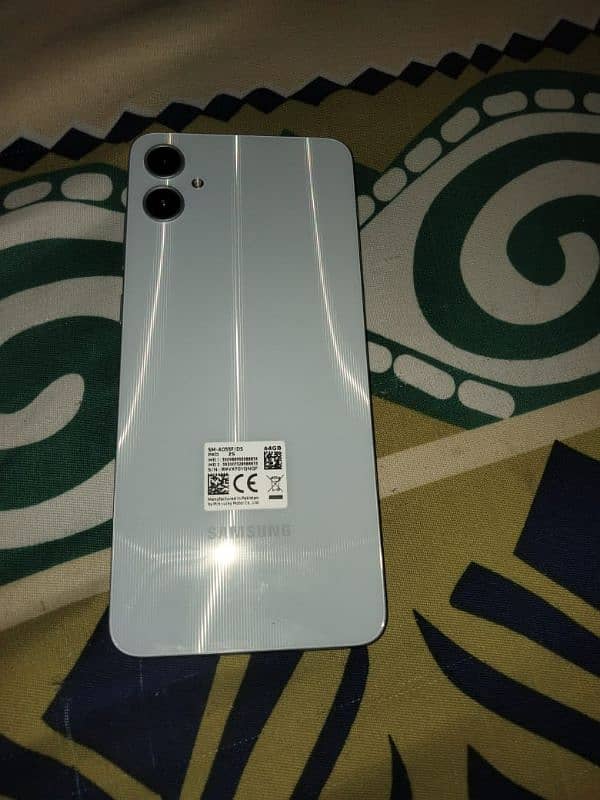 Samsung a05 white colour 10/10 condition 1 month bhi use nhi hua h 1