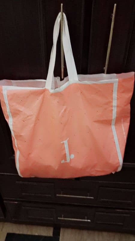 brand_J. new article only 1 pc  with j. bag 3