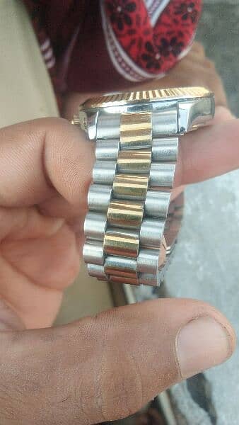 rolex watch in goldan bilkul ok 2