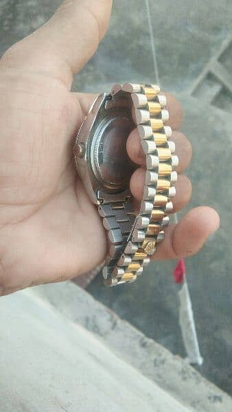 rolex watch in goldan bilkul ok 5