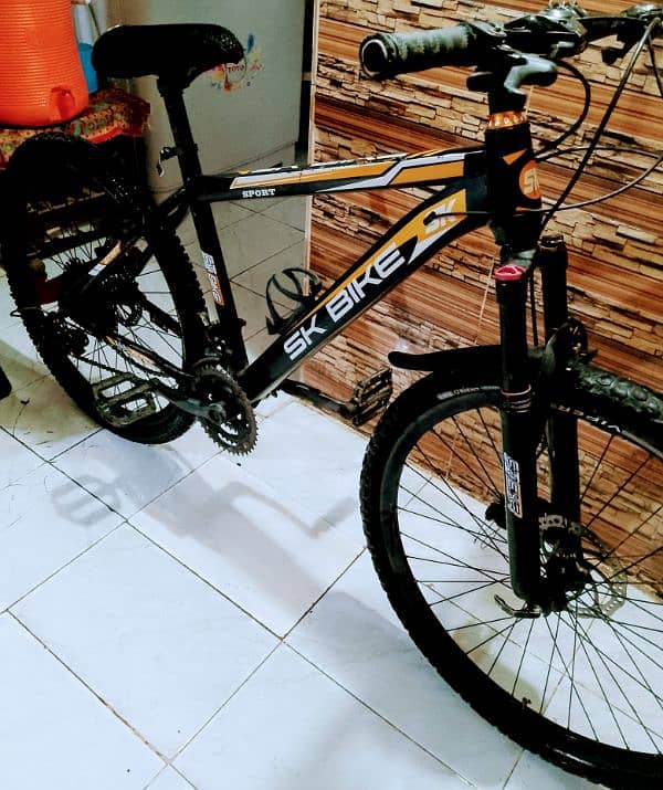 bicycle impoted full size 26 inch brand new 5 month used 1