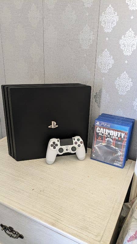 PS4 Pro 4k for sale with 1 genuine controller and 5 games  (Cheap) 2