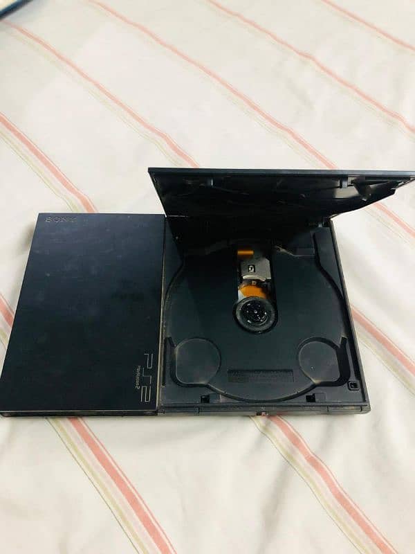 PS2 Slim For sale , Condition like new one 5