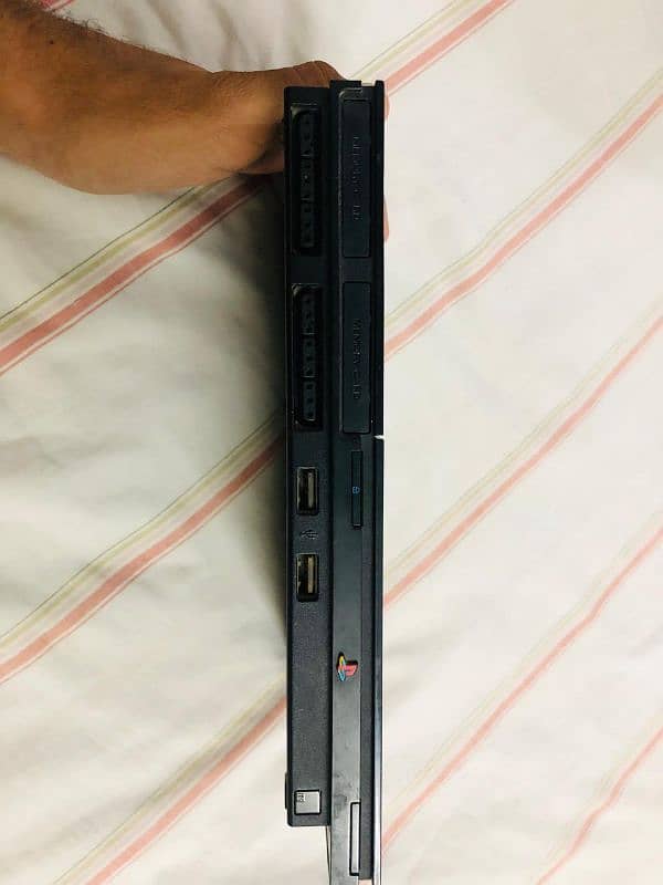 PS2 Slim For sale , Condition like new one 7