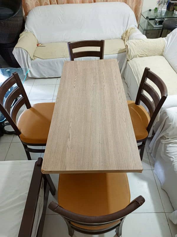 Restaurant or office chair table made in heavy stylish wood. 1