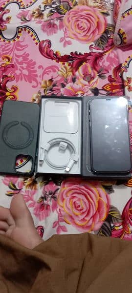 I phone 12 pro 10 by 10 with box and charger and charging cover 5