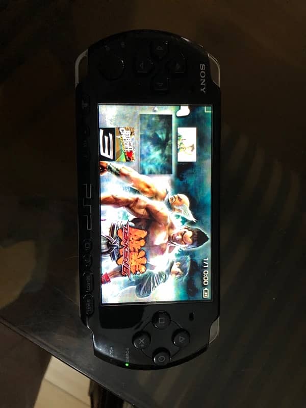 PSP 3004 With Box, Charger and Games 16GBCard 6