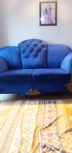 Blue velvet sofa