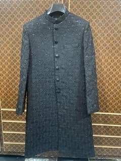 Black sherwani with kulla and khussa