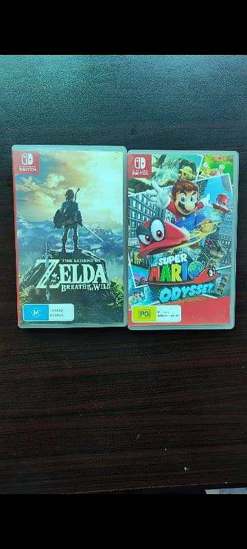 Nintendo switch lite ( complete box + 2 games ) 4