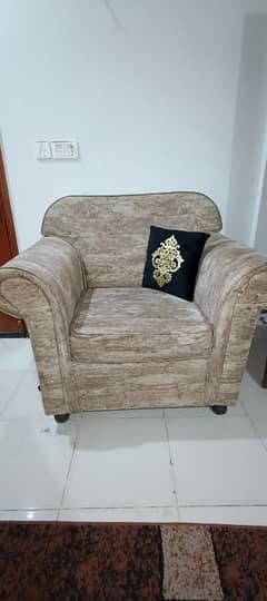 Urgent sell 7 seater sofa set with free table and cushions