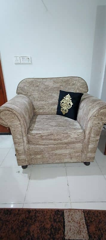 Urgent sell 7 seater sofa set with free wooden table and cushions 0