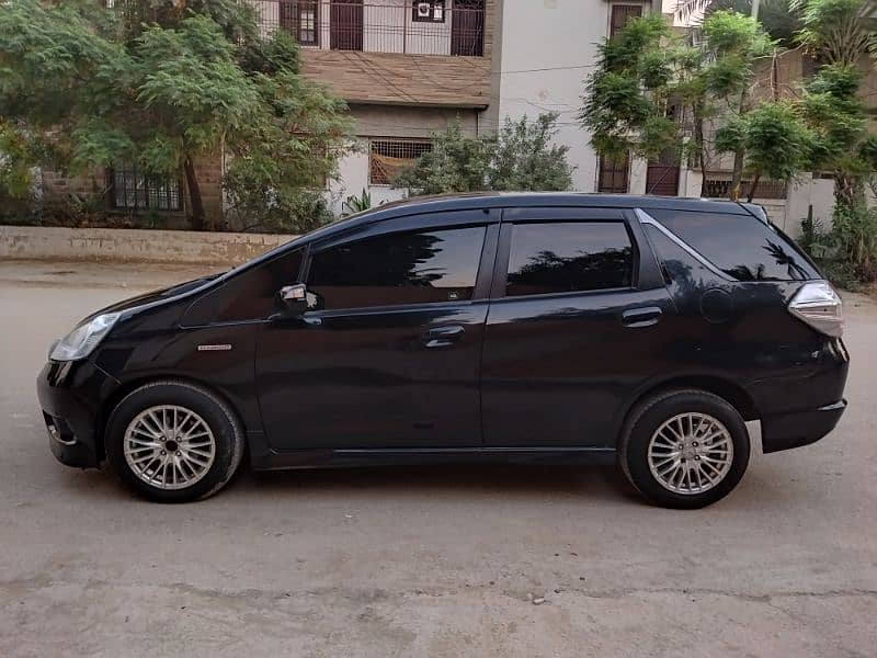 Honda fit shuttle 2012 reg 2021 Pearl black highly maintain 14