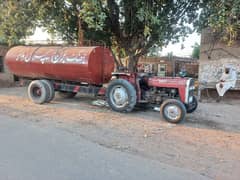 mf240 tractor and water tank 0